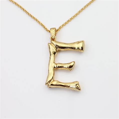 celine letter necklace replica|bamboo initial necklace celine.